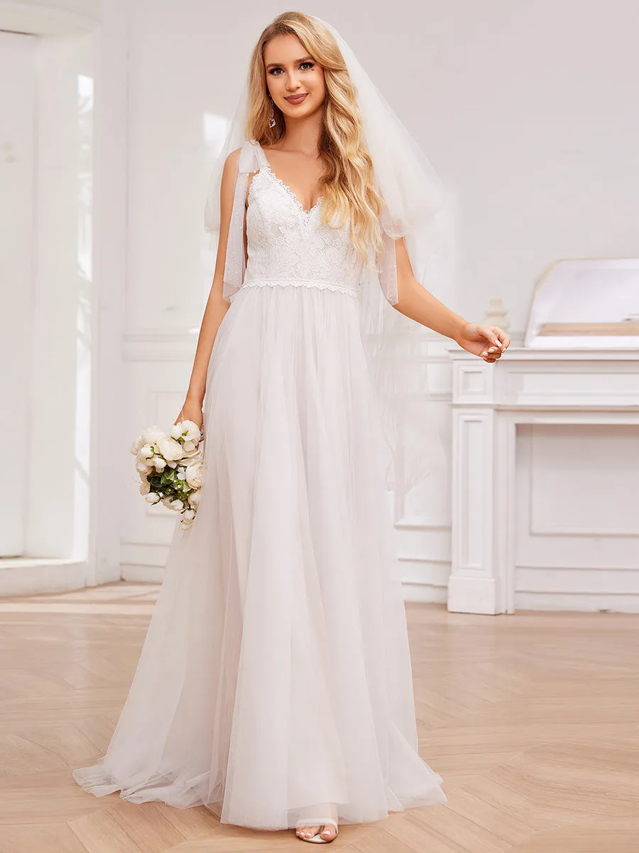 Exquisite Deep V Neck Sleeveless Lace Tulle Empire Waist Wedding Dresses with Bowknot Bandage