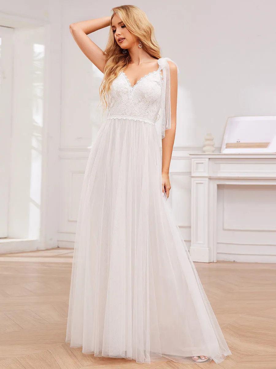 Exquisite Deep V Neck Sleeveless Lace Tulle Empire Waist Wedding Dresses with Bowknot Bandage